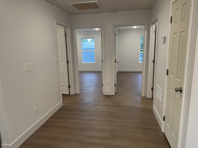 Entryway to both bedrooms - Sunrise Suites Apartments