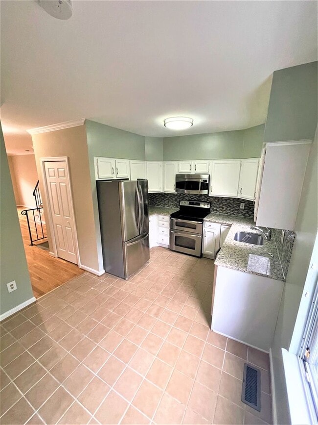 Photo - Updated, all brick 3 level townhouse pet friendly townhouse for rent!