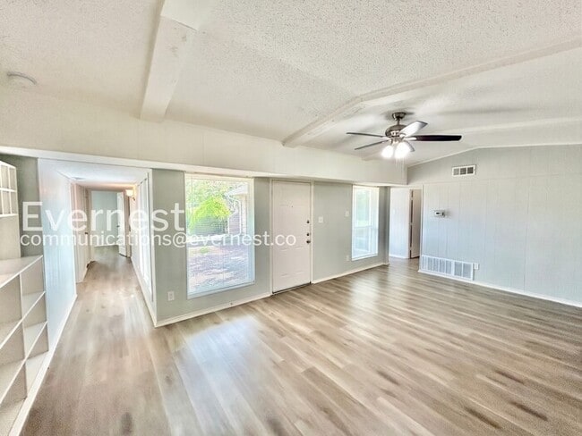Photo - Spacious 4 Bed, 2 Bath Home with Fenced Yard & Carport / Available Now!