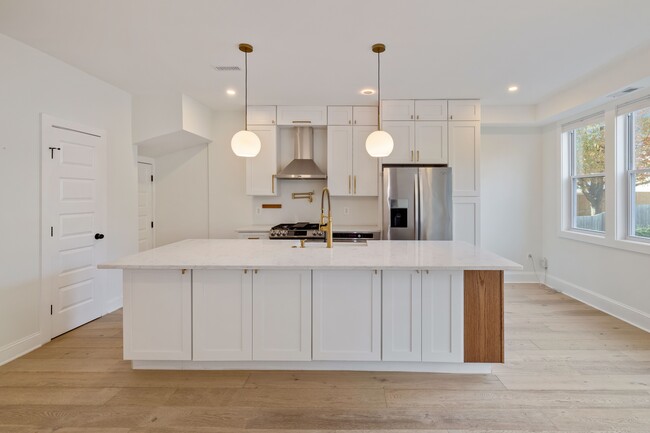 Gourmet kitchen with high-end appliances - 205 Webster St NW Townhome