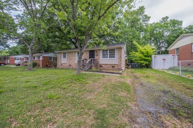 Photo - 3-bedroom, 1-bath home with a fenced-in yard, located on Guerrant Street in Greensboro