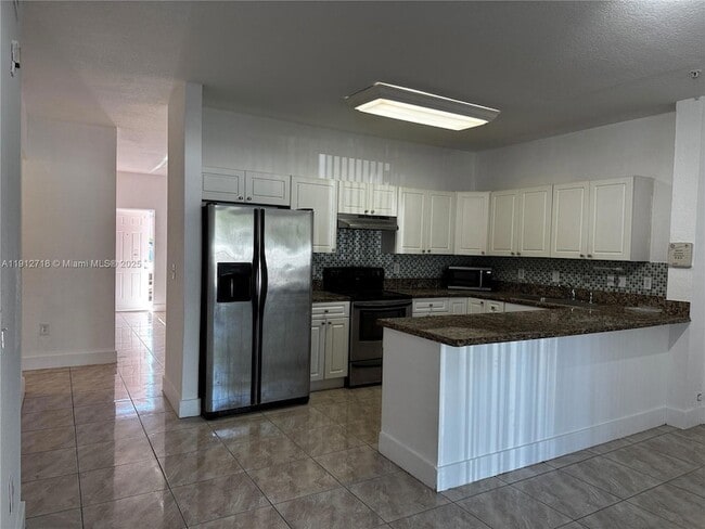 Photo - 17350 NW 67th Ave Unidad 109 Rental
