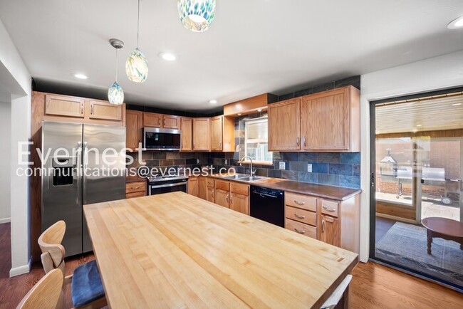 Photo - 4-Bed/2-Bath House Charming Home with Fenced Yard/ Available Now!