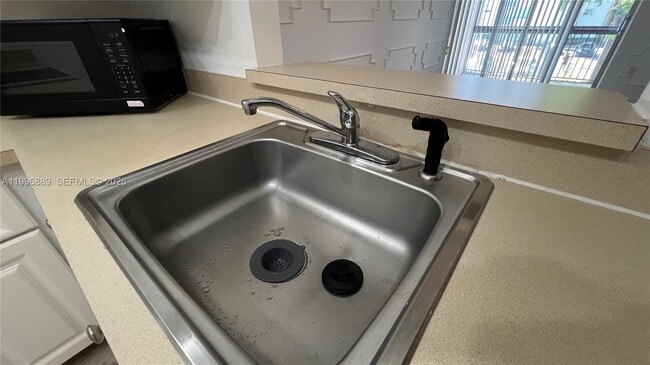 Photo - 711 N Pine Island Rd Unit 211