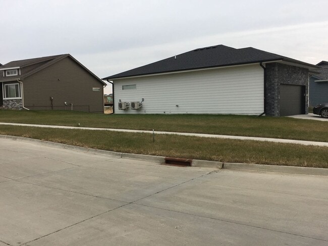 Photo - Spacious 4 bedroom/3 bath home with finished lower level and attached 2 car garage