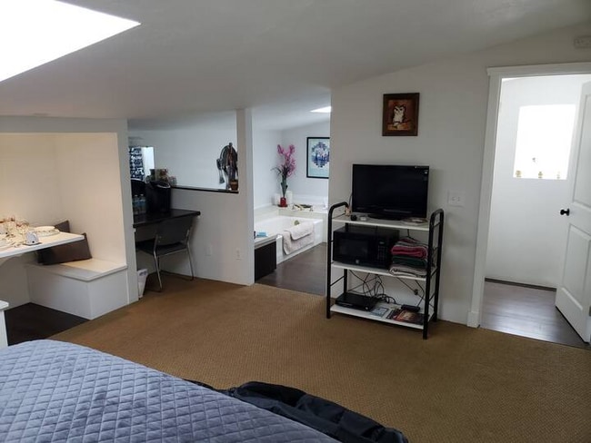 Photo - 37711 E Benton Rd Unidad Master Bedroom and shared kitchen