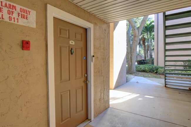 Building Photo - 7667 N Wickham Rd Unit 506