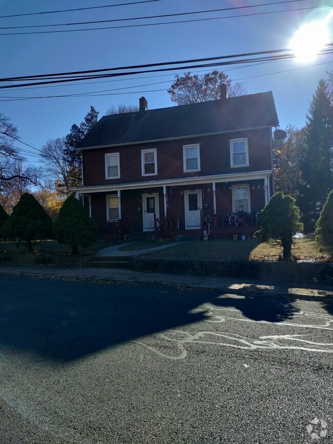 Front of the house. Unit is on the left - 110 Walnut St Rental