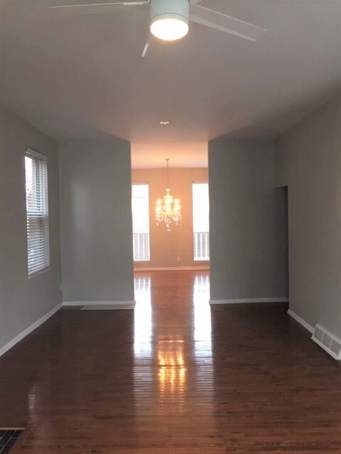 Living Room into Dining Room - 5717 Howe St Apartments Unit 1