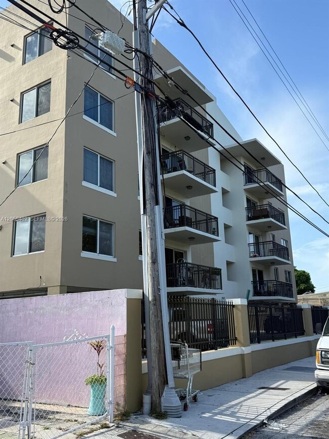 Building Photo - 1100 NW 71st St Unit 304