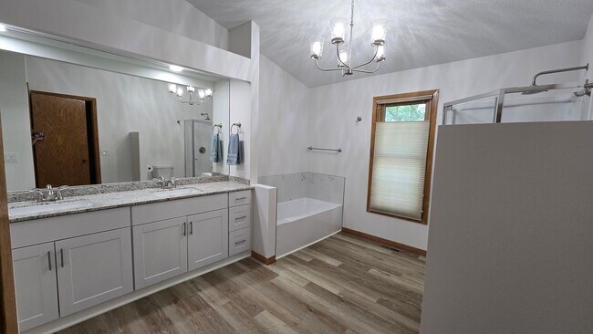Master Bathroom has tub - 2303 Grange Ave N