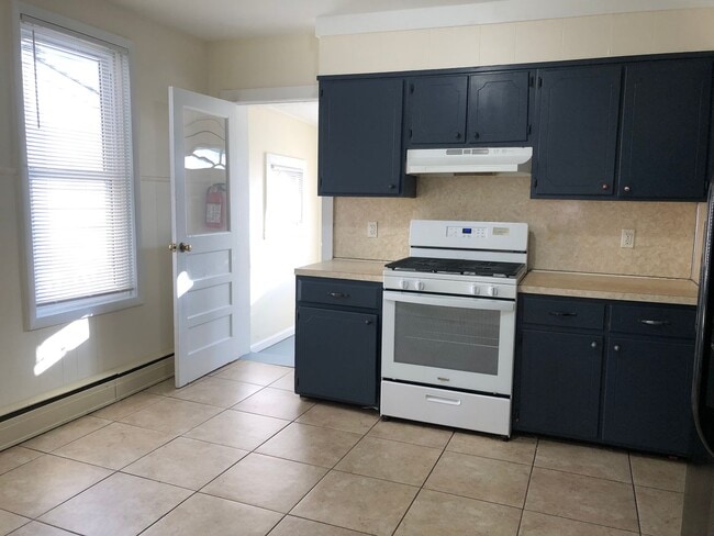 Photo - Great Home! Spacious and Updated! Wood Flooring! New Window! Eat-in-Kitchen! Yard!