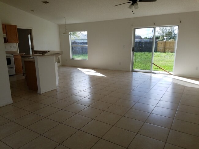 Photo - Palm Bay Home - fenced yard