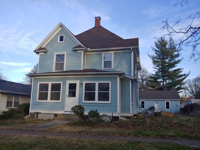 Front porch entrance to 2nd floor apartment - 704 S Broadway Ave Unit Apartment 2