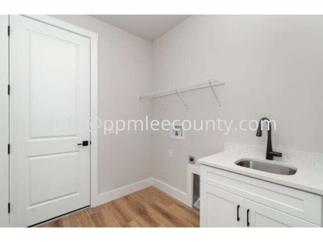 Photo - Brand new 4 bedroom 2 bath 3 car garage po...