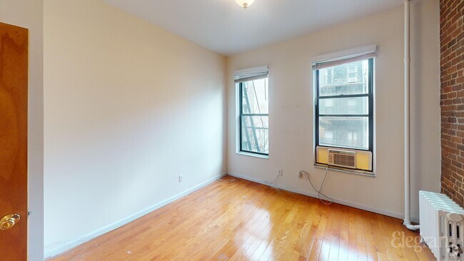 Building Photo - 421 E 73rd St Unit APT 3C