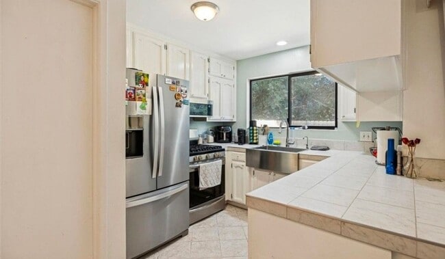 Photo - 2 bedroom condo with garage