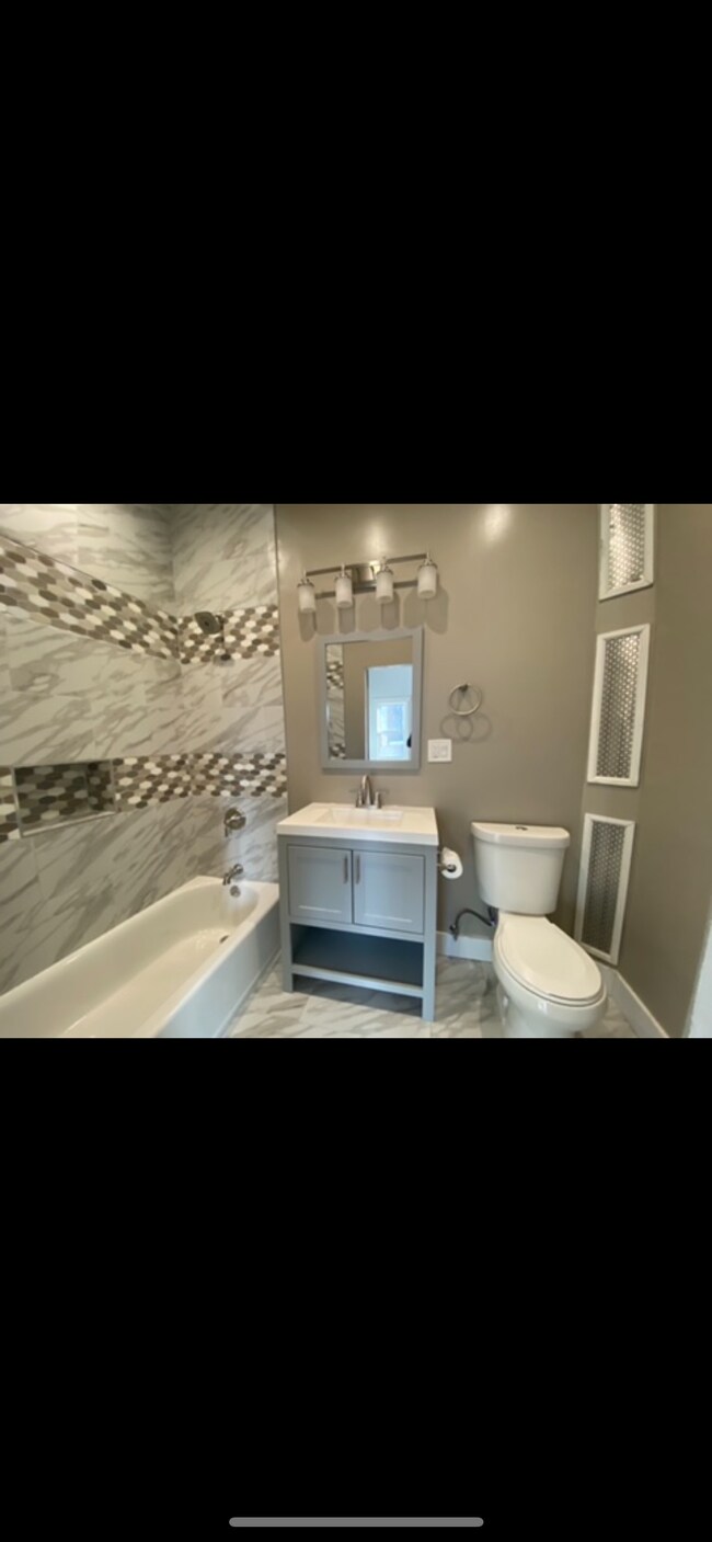 Spa inspired bathroom with 10 foot high ceiling - 1202 Rogers Ave Unit 1202 Rogers Ave. Apt #3b