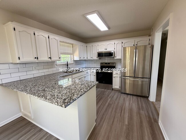 Photo - Beautifully Updated 3 Bed, 2 Bath Split-Level Home with Finished Basement