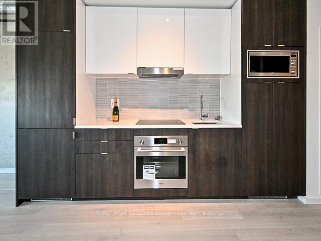 Photo - 21 Lawren Harris Square Unit 418