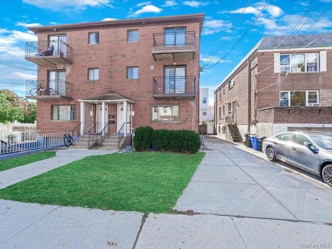 Building Photo - 214-16 40th Ave Unit 2nd Floor