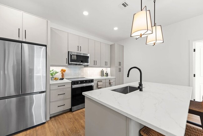 Building Photo - River's Edge Residences