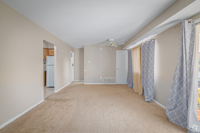 1BR, 1BA - Living and Dining Room - Maiden Choice Apartments
