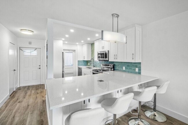 Photo - 698 NE Spanish River Blvd Unit 14