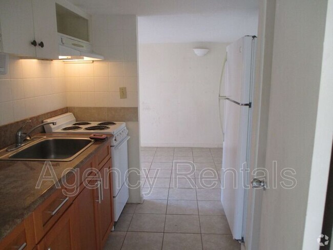 Building Photo - 1007 7th Ave Unit #C Rental