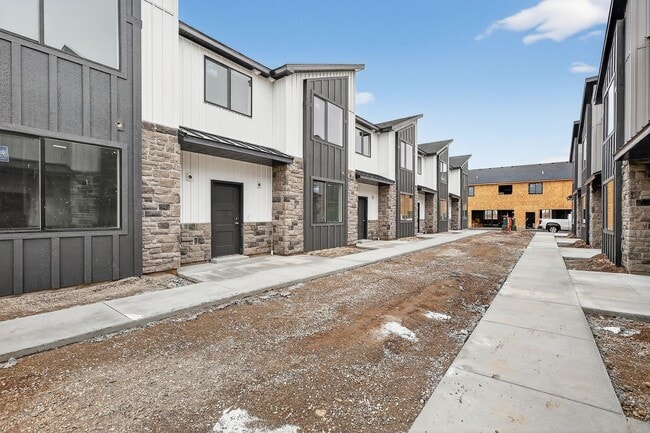 Building Photo - BRAND NEW 3 BED 2.5 BATH TOWNHOMES WITH 2 CAR GARAGE