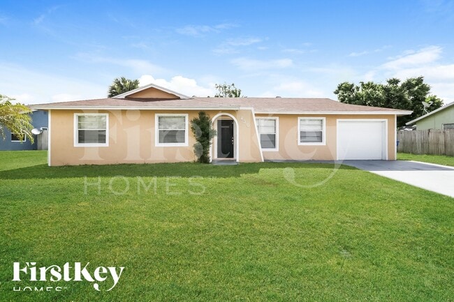 Building Photo - 830 Royal Palm Beach Blvd