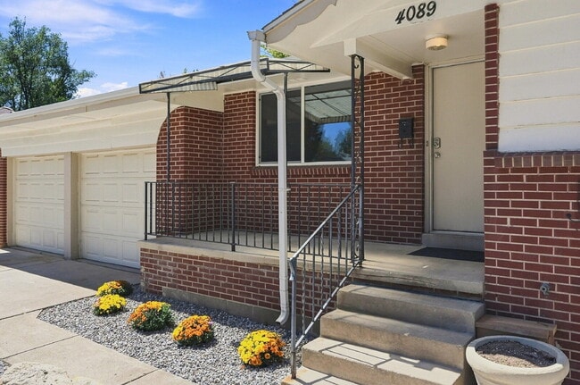 Photo - AVAILABLE NOW
Spacious 4-Bedroom Wheat Ridge Home with Finished Garden Level, Two-Car Garage & B...