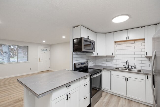 Building Photo - Remodeled 3 Bedroom 2 Bathroom Home, yard, carport