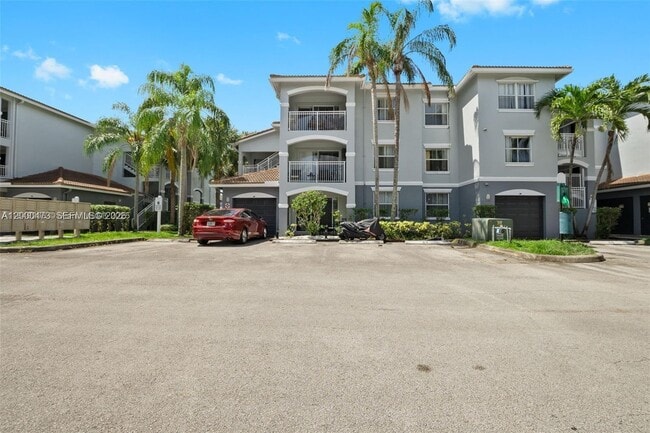 Building Photo - 9645 NW 1st Ct Unit 1-303