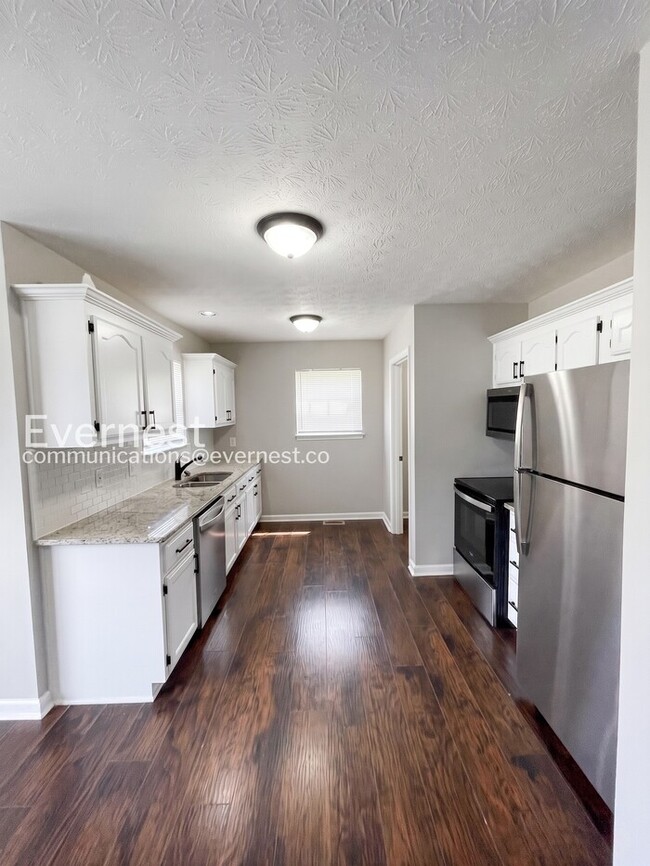 Photo - 3 Bed, 2 Bath Home with Off-Street Parking / Pet-Friendly / Available Now!