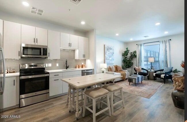 Building Photo - 9449 N 90th St Unit A1