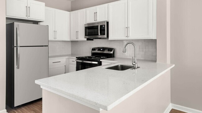 Cocina con electrodomésticos de acero inoxidable - Summit Crossing