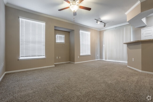 1BR, 1BA - 706SF - Living Room and Dining Room - Estates at Fountain Lake