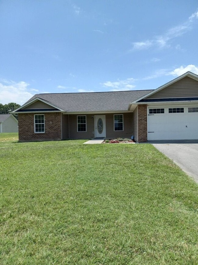 Building Photo - Now accepting application for 3 bedroom 2 bath brick home in White Pine, TN