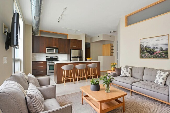 Building Photo - Modern 2-Bedroom Apartment with Private Pa... Unit 209