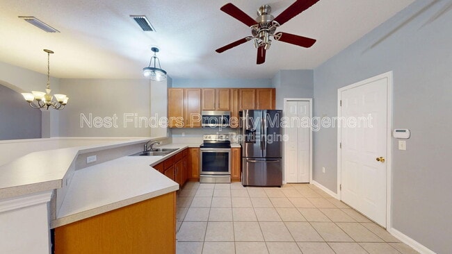 Building Photo - 9744 Summer Grove Way W Rental