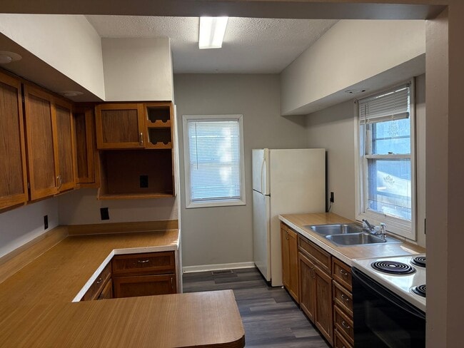 Photo - 4 Bedroom 2 Bath 1/2 Off First Months Rent!