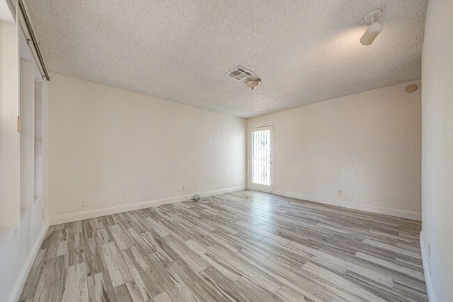 Photo - Charming Single-Level Townhome with Modern Flooring & Update Bathroom & Kitchen