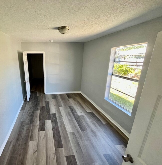 Photo - 3BR/1BA with HUGE Backyard, LVT Wood Floor...