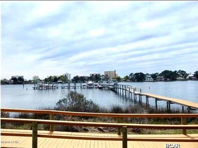 Photo - WATERFRONT W/BOAT SLIP!!!! This beautiful home is located in a gated community on North Lagoon Dr...