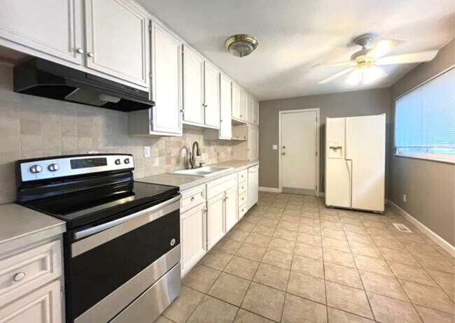 Photo - Spacious 3-Bedroom Ranch with Fenced Yard, Garage Workshop & Prime East Normal Location