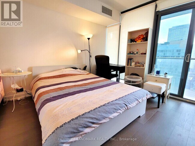 Photo - 11 Wellesley St W Unit 1110