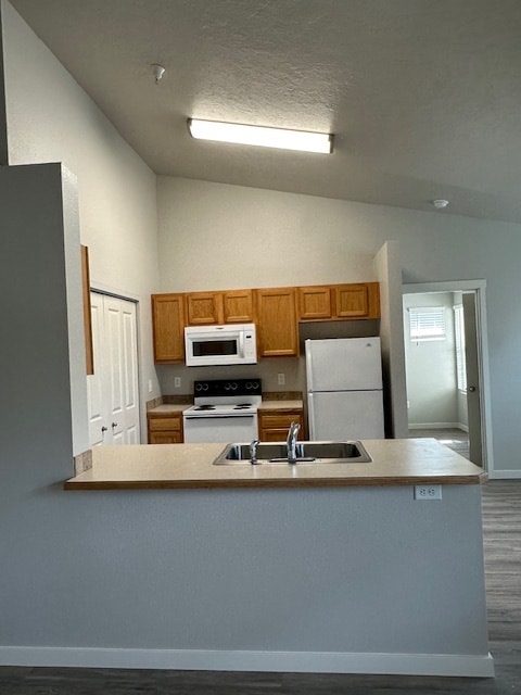 KITCHEN AND LAUNDRY AREA - Faith Landing Apartments