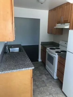 Building Photo - 3232 14th Ave Unit 14