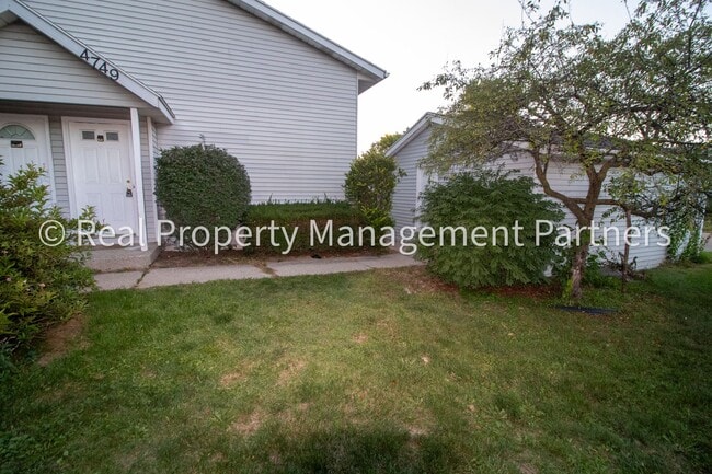 Photo - 2-Bed, 1-Bath Upper Unit with Garage & Porch – Steps from Paul Henry Trail